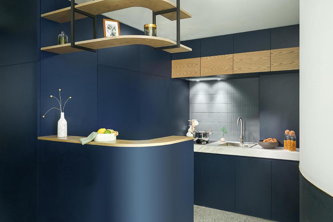 Selected One-Bedroom Apartment kitchen washing machine large refrigerator