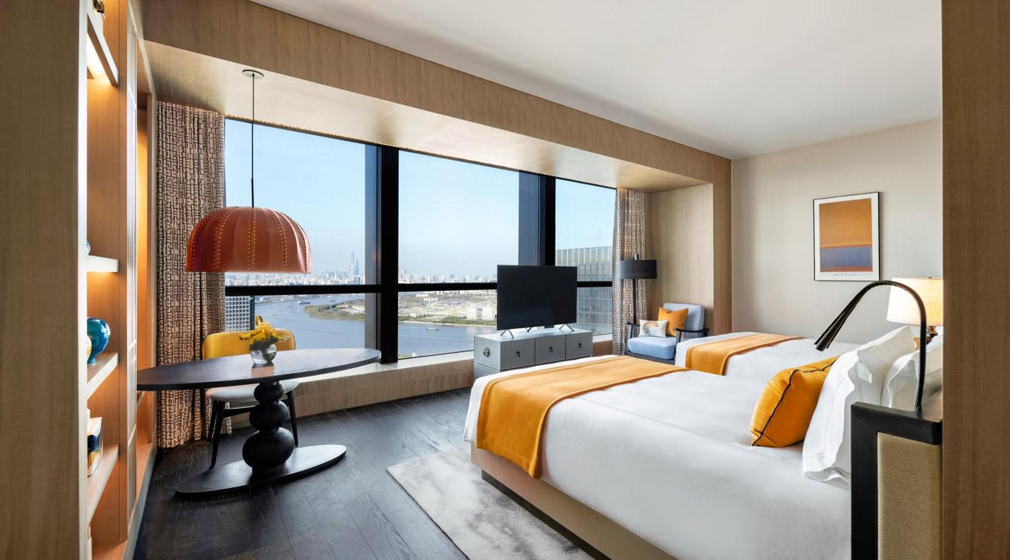 Quarto Deluxe com 2 Camas de Solteiro e Vista do Rio