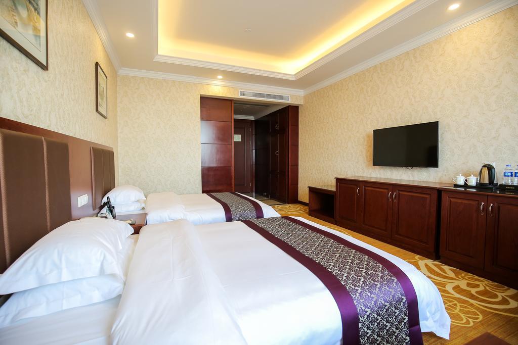 Quarto Duplo Deluxe com 2 Camas de Casal